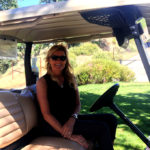 woman in golf cart